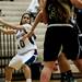 Green Hills junior Hajra Bhurgri looks to pass on Monday, Feb. 11. Daniel Brenner I AnnArbor.com